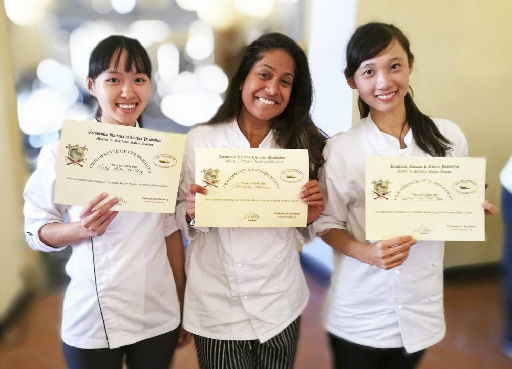 Chefs with certificates after finishing the Master cooking class